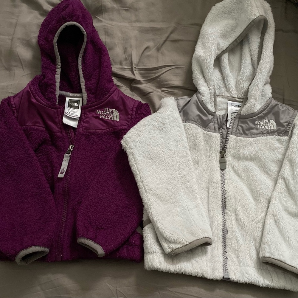 TWO toddler Northface zipper up fleece. Purple 2T white is 18-24 Used condition